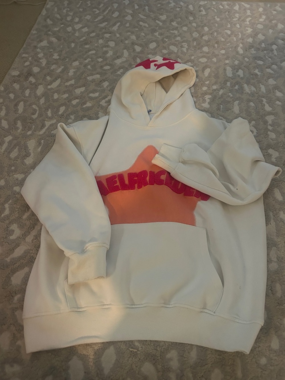 Aelfric Eden Cream Hoodie with Orange Star and Pink Accents